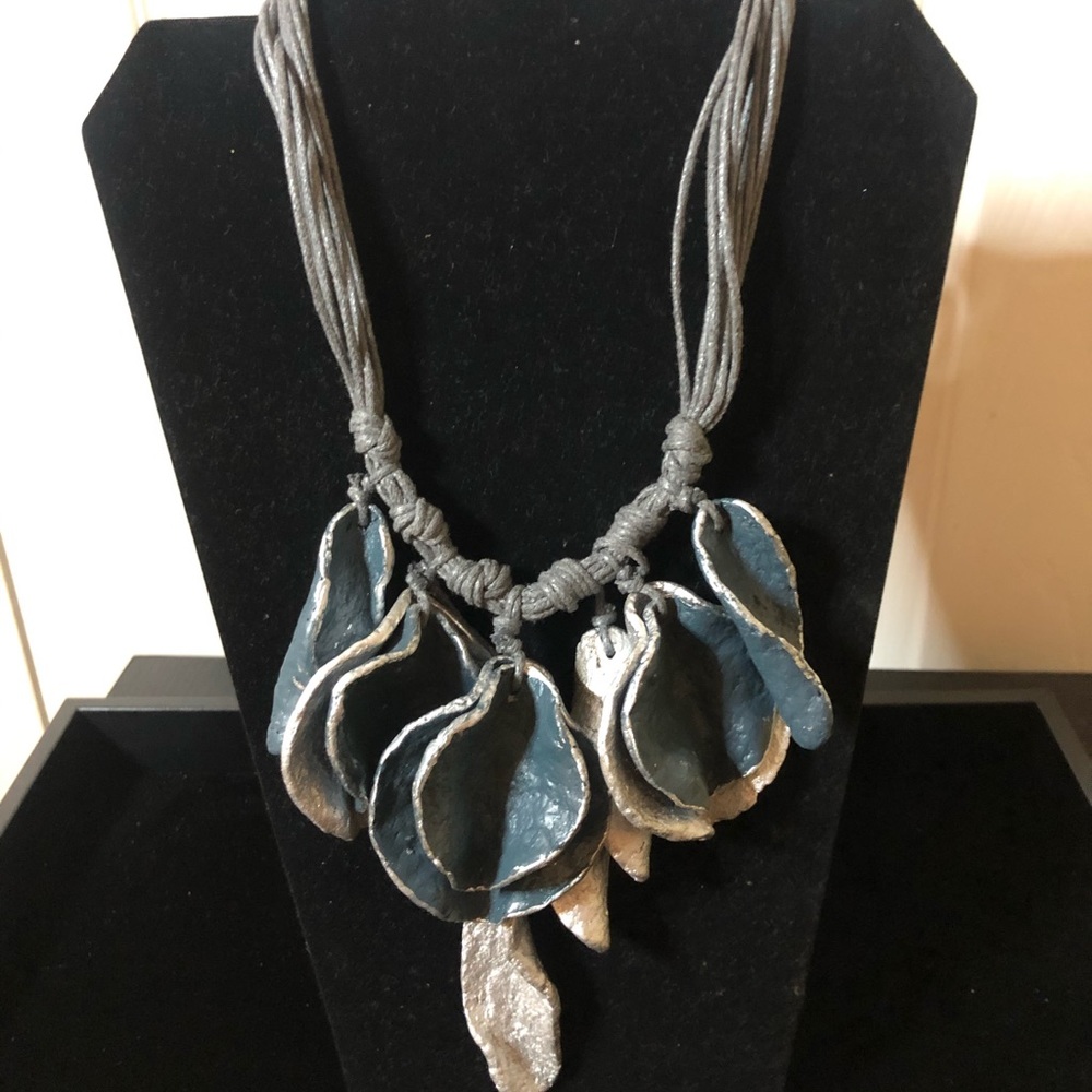 Blue and grey leather necklace.